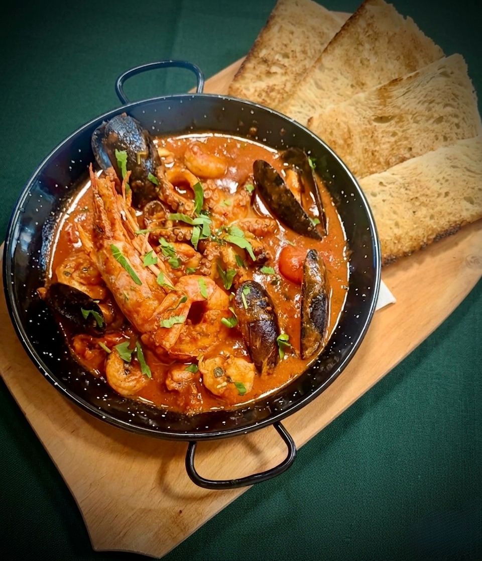 Tigaia picanta cu fructe de mare